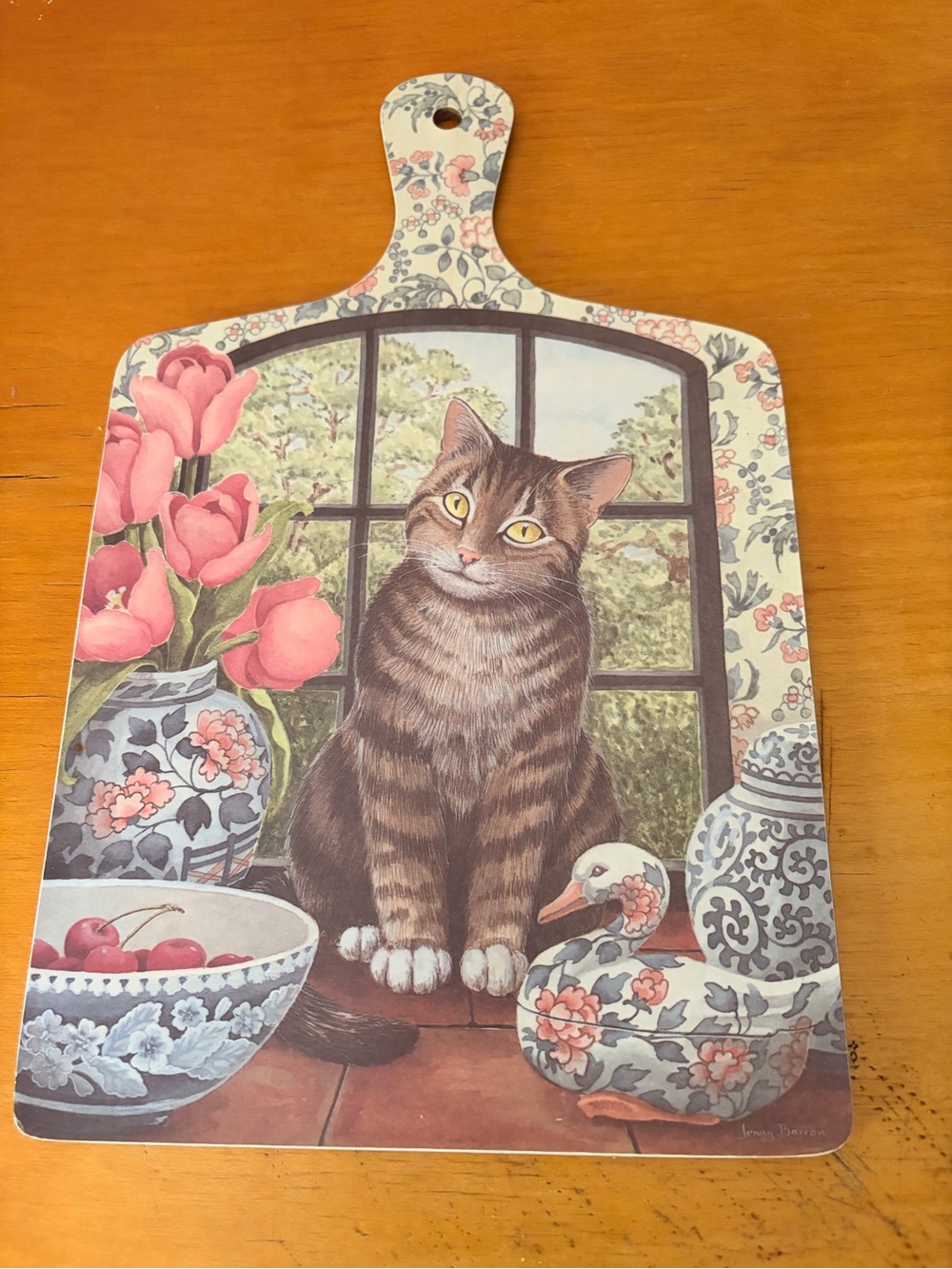 Collectible vintage chopping board cat and duck